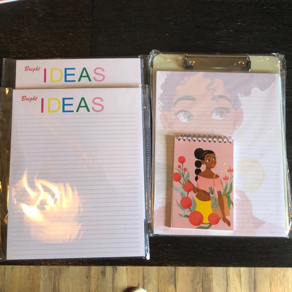 Other - Clip board with paper included, 2 additional note pads, 1 small spiral note pad